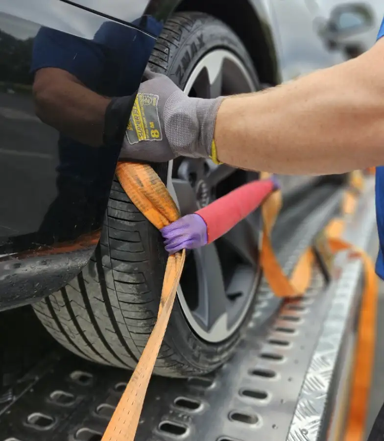 JC Recovery and Tow Truck services Strapping car tyo tow truck about us page image