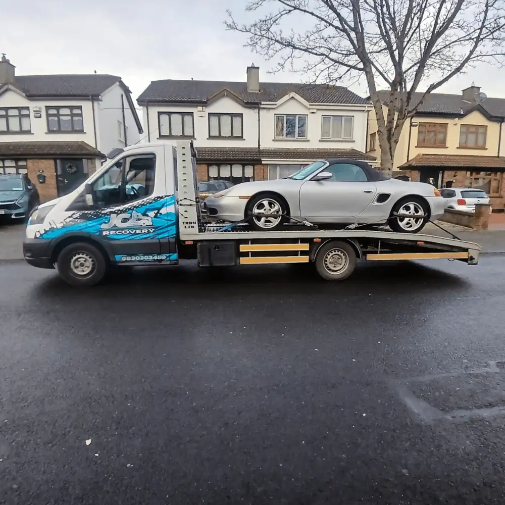 JC Recovery – Car Collection transporting image three (1)